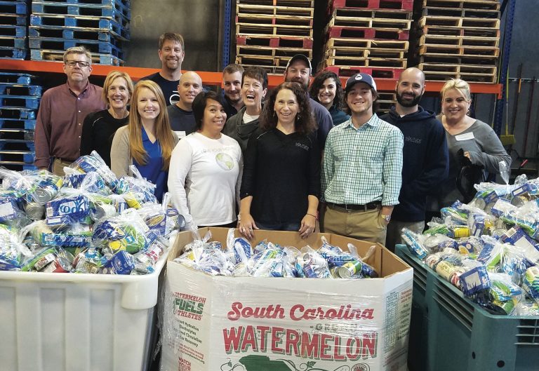 4_Team Volunteering Food Bank Newport News Magazine